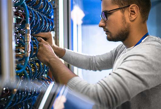 Engineer Wearing Glasses Services Data Centre Equipment